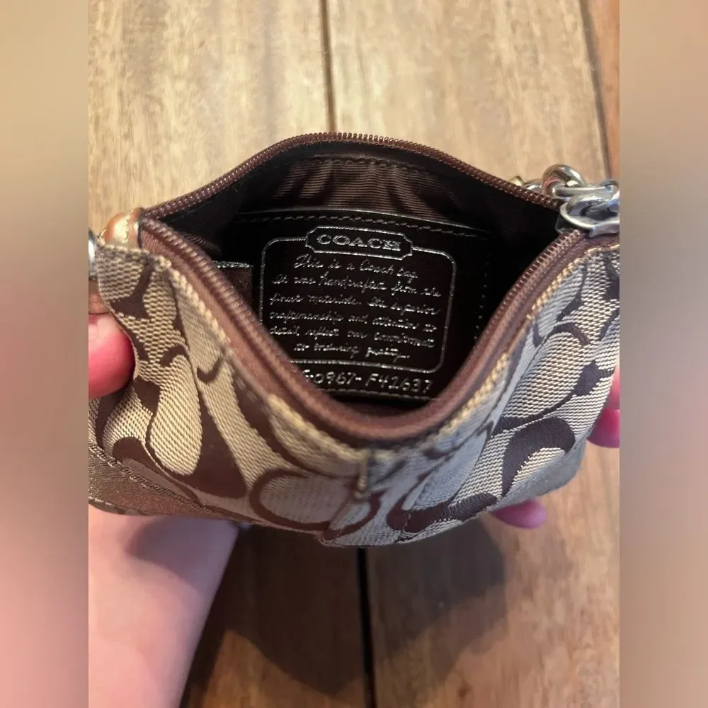 Coach Brown and Tan Signature Wristlet with gold stripe. Vintage 4x6 inches